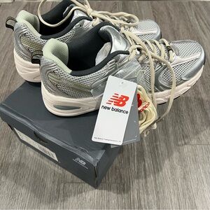 New Balance Metallic and White Running Shoes